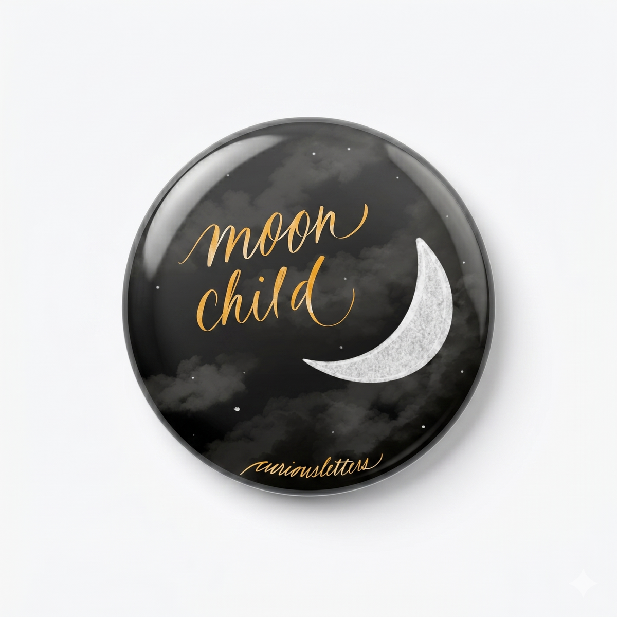 A 2-in-1 "moon child" bottle opener and fridge magnet, of 58 mm diameter and sturdy metal body, with art by Curious Letters. 